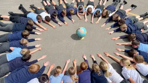 Primary pupils rap to ‘change the world’