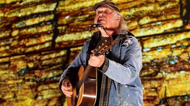 Neil Young cancels upcoming tour dates because of band members’ illness